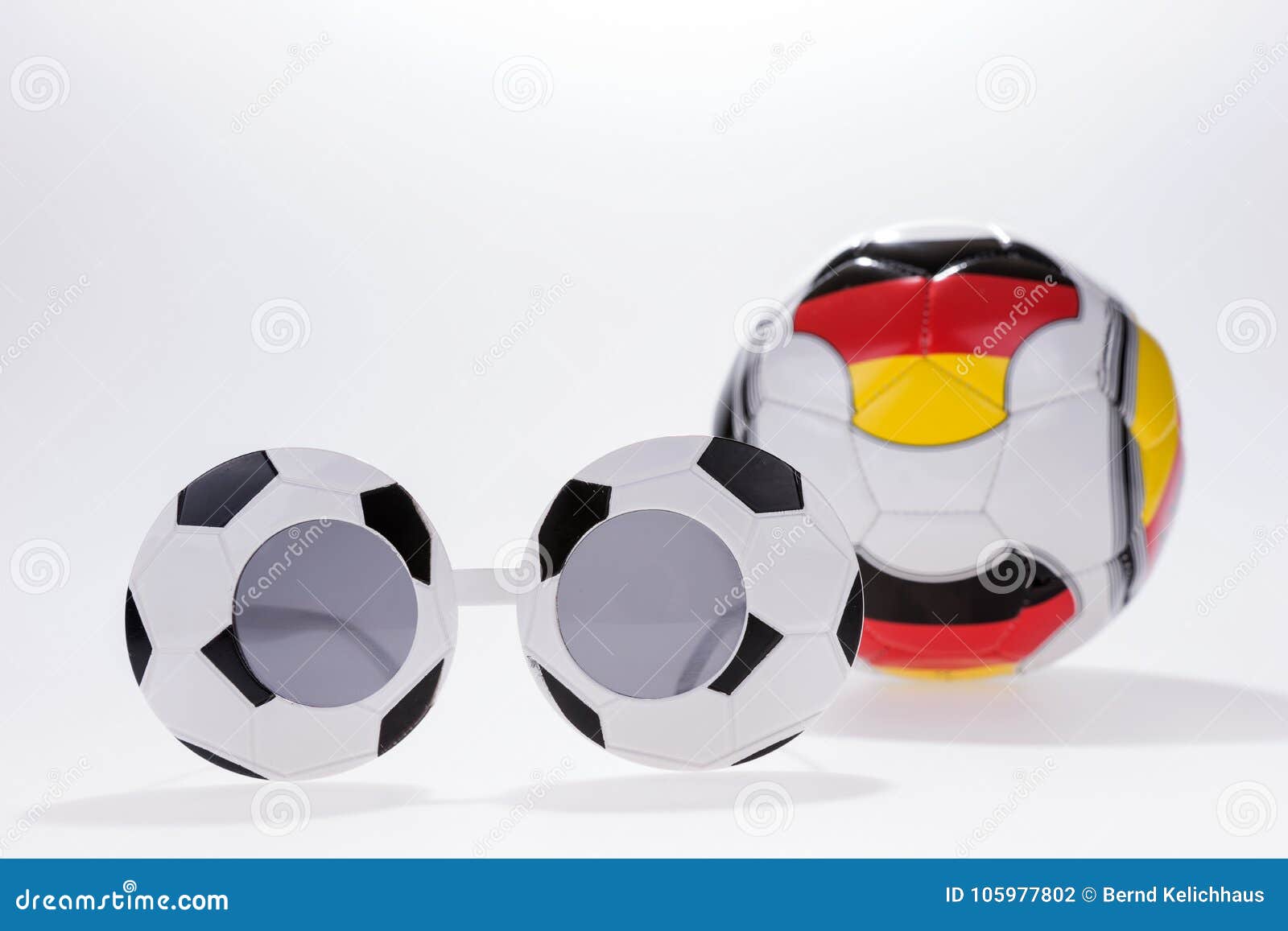 Football Sport Spectacles and Soccer Ball with German Flag Stock Photo