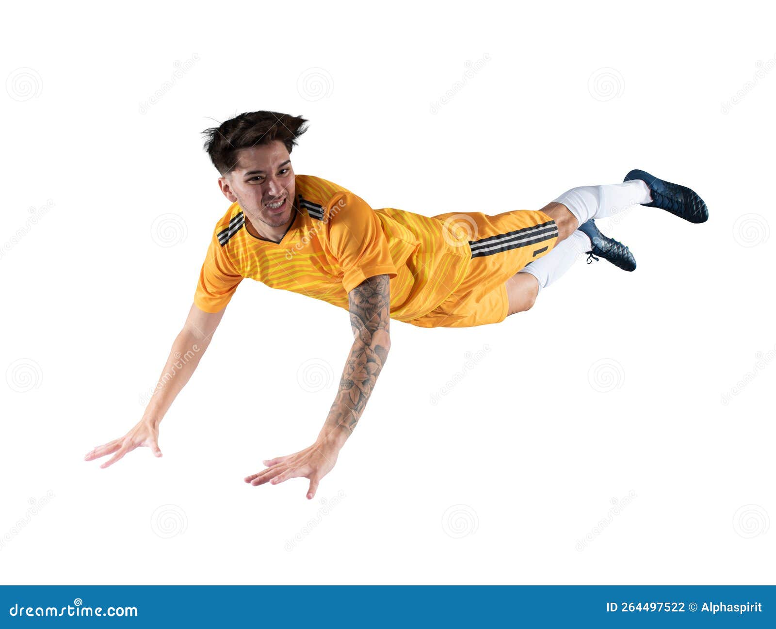 football striker player with yellow team suit jumps