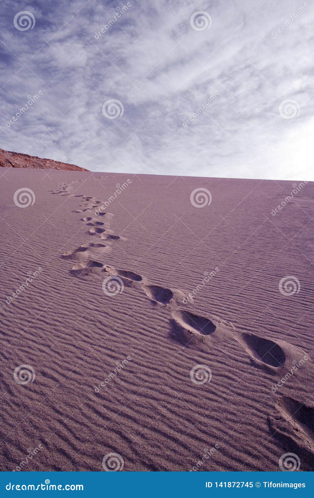 footprints in a sand dune in the desert at valle de la muerte, spanish for death valley