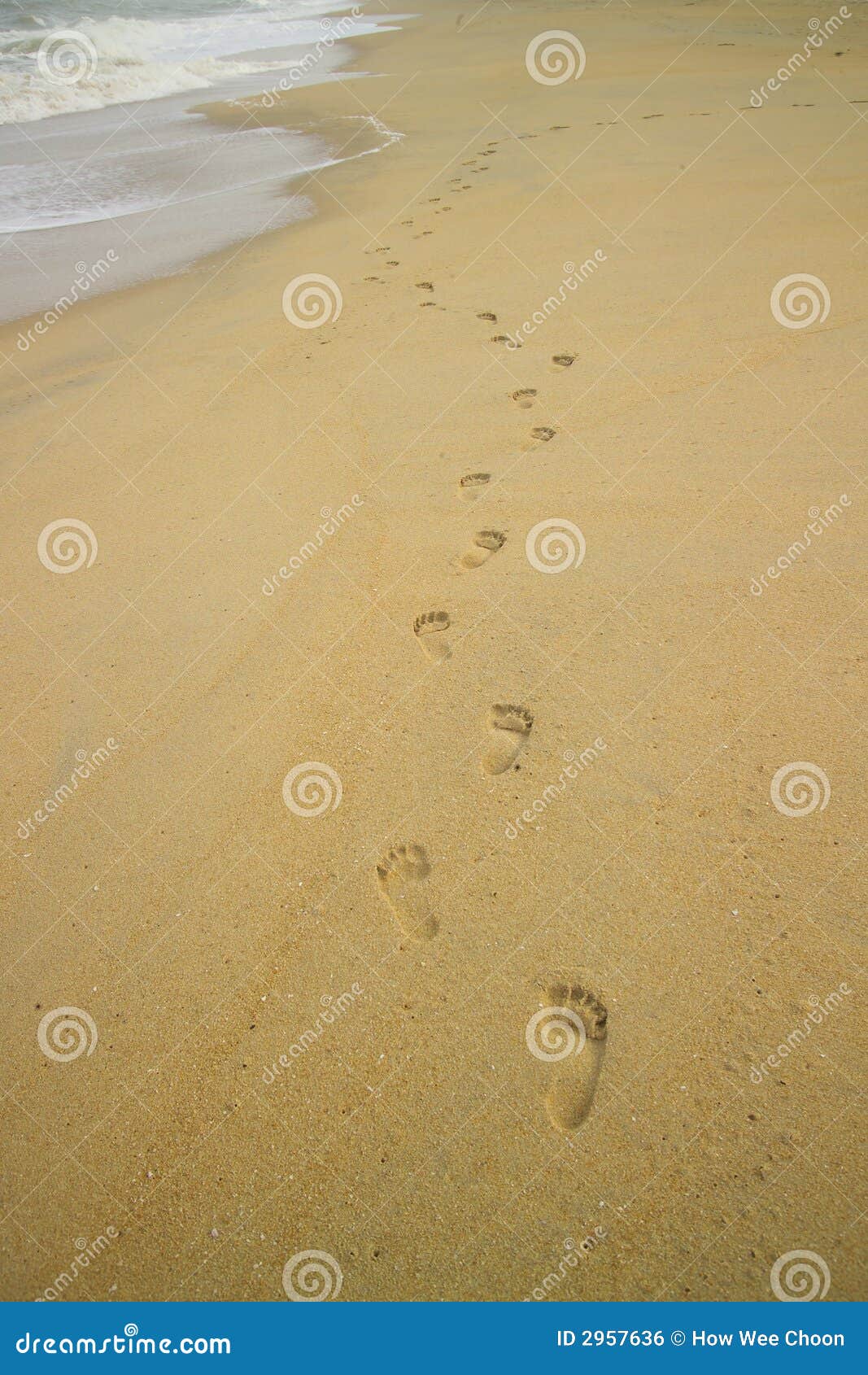 foots steps on the beach