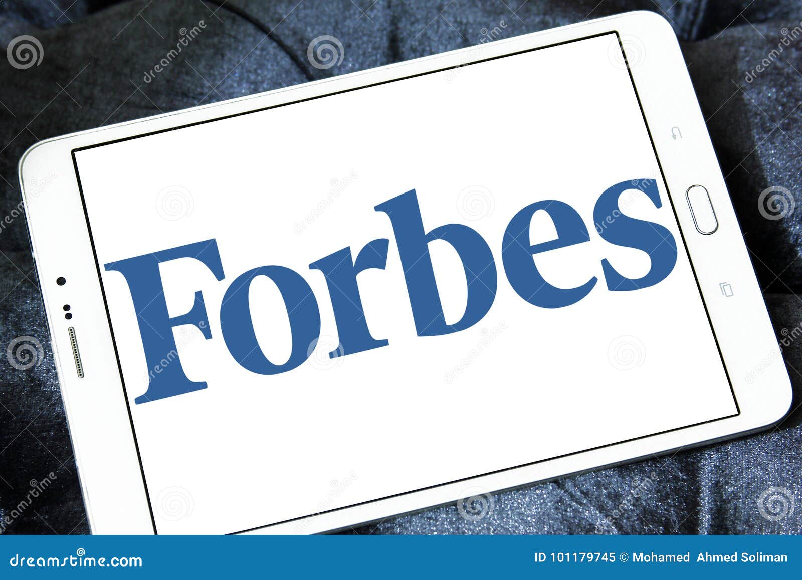 Forbes magazine logo. Logo of Forbes magazine on samsung tablet. Forbes is an American business magazine. it features original articles on finance, industry, investing, and marketing topics. Forbes also reports on related subjects such as technology, communications, science, politics, and law