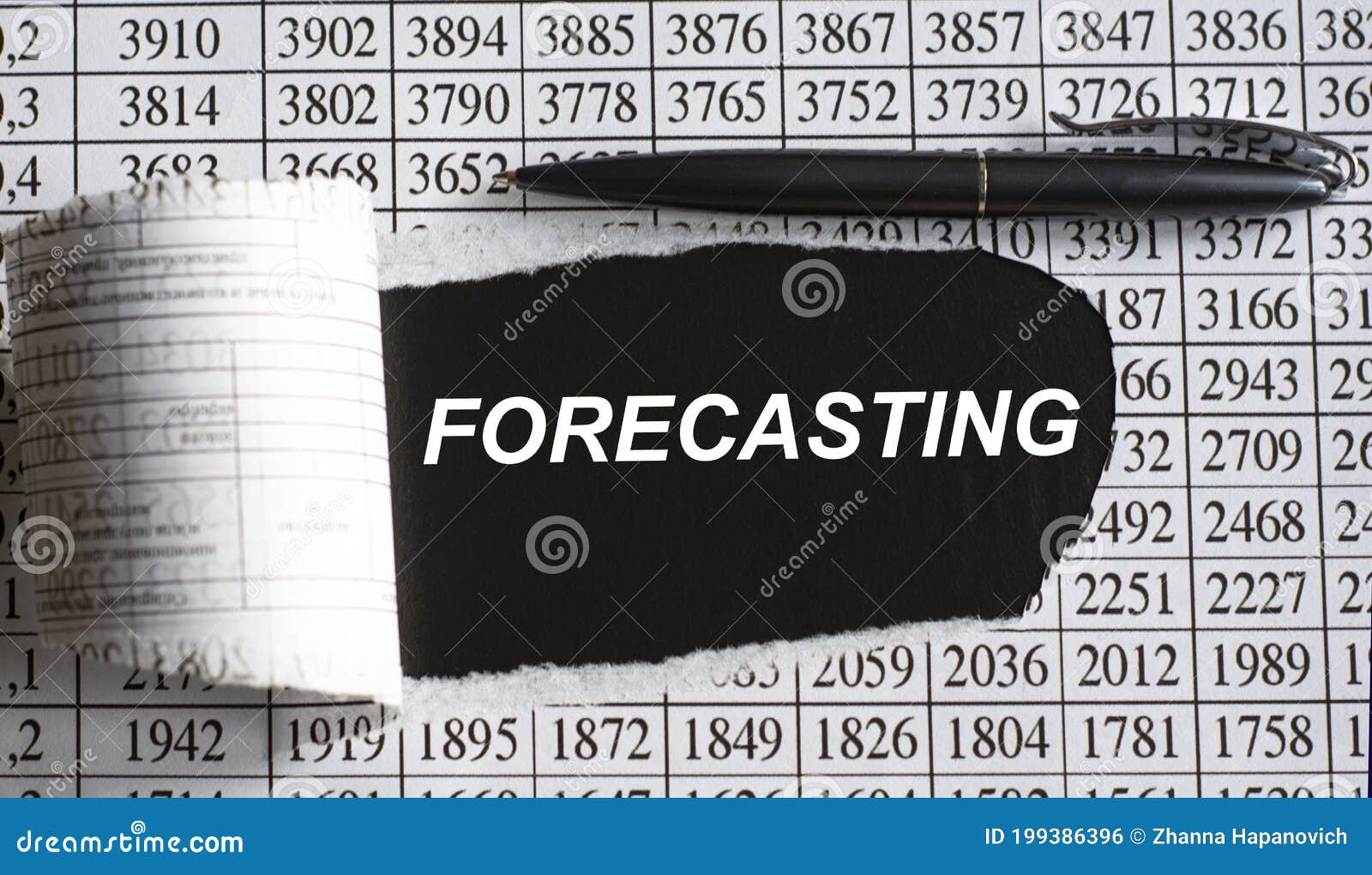 forecasting is the word behind torn office paper with numbers and a black pen