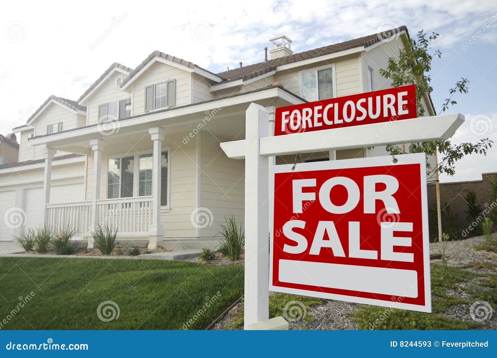 foreclosure home for sale sign and house