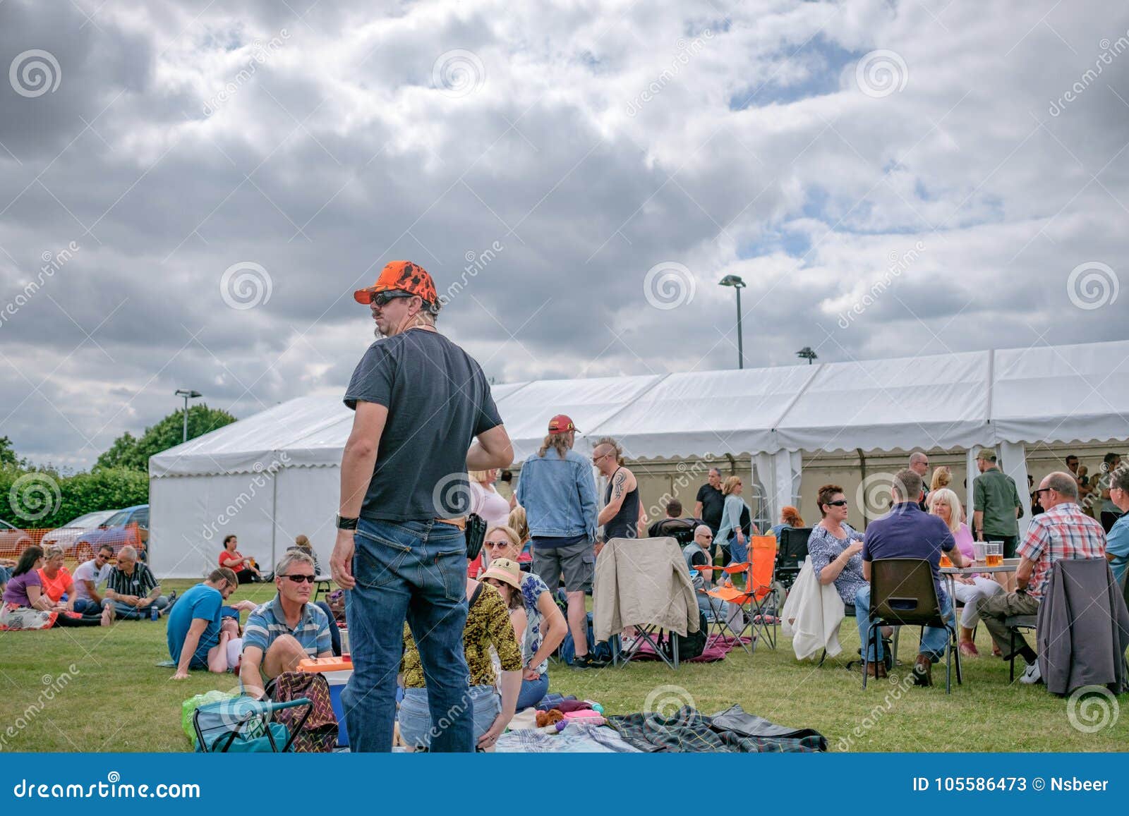 Crowds Of People Seen At An Outdoor Rock Music Festival Editorial Stock