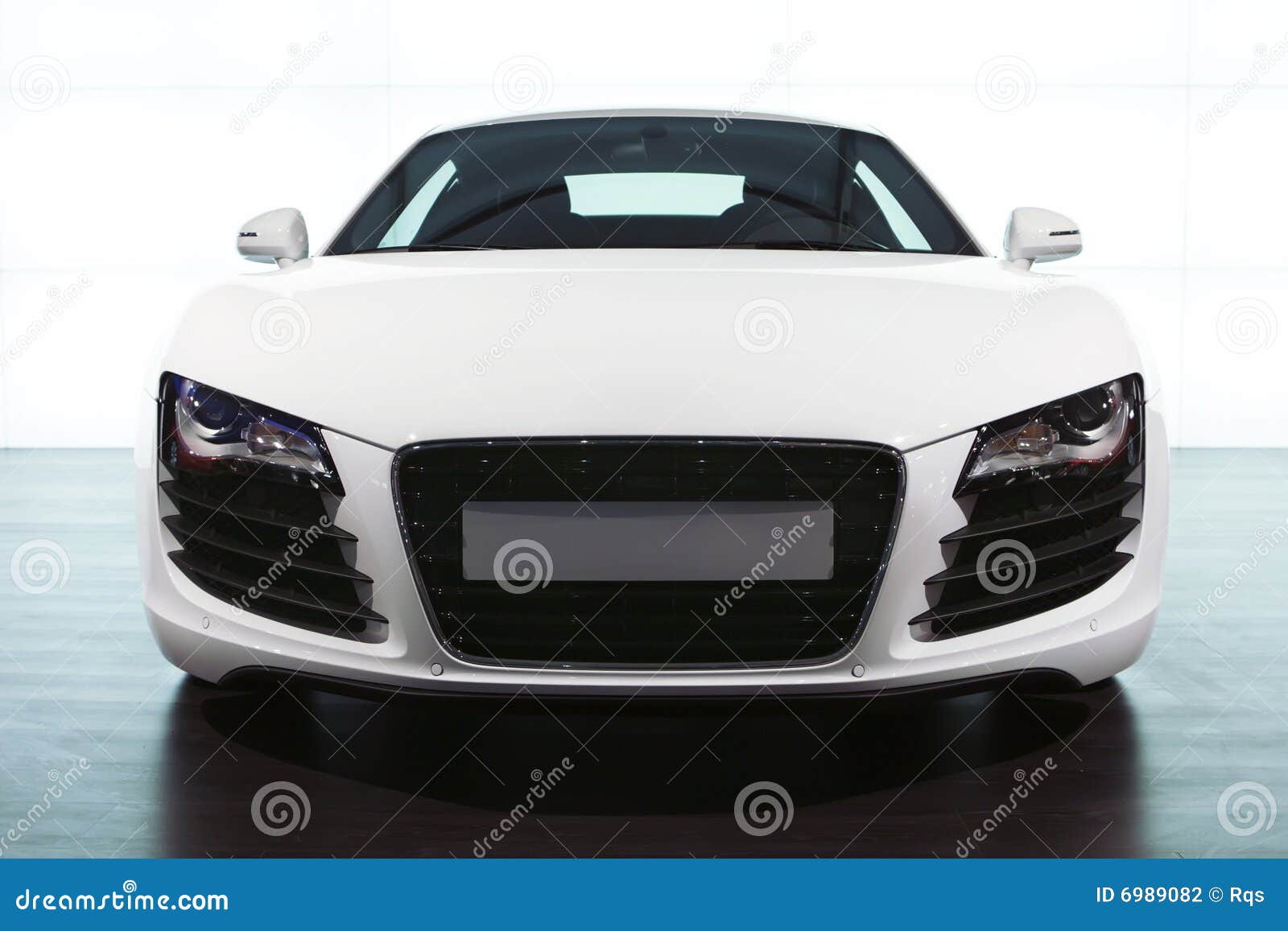 foreground of white sportcar audi