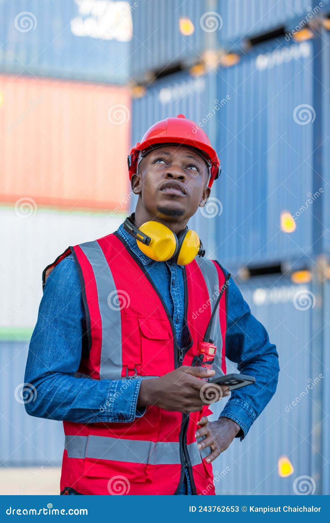 Foreman or Worker Work at Container Cargo Site Hand Holding Mobile
