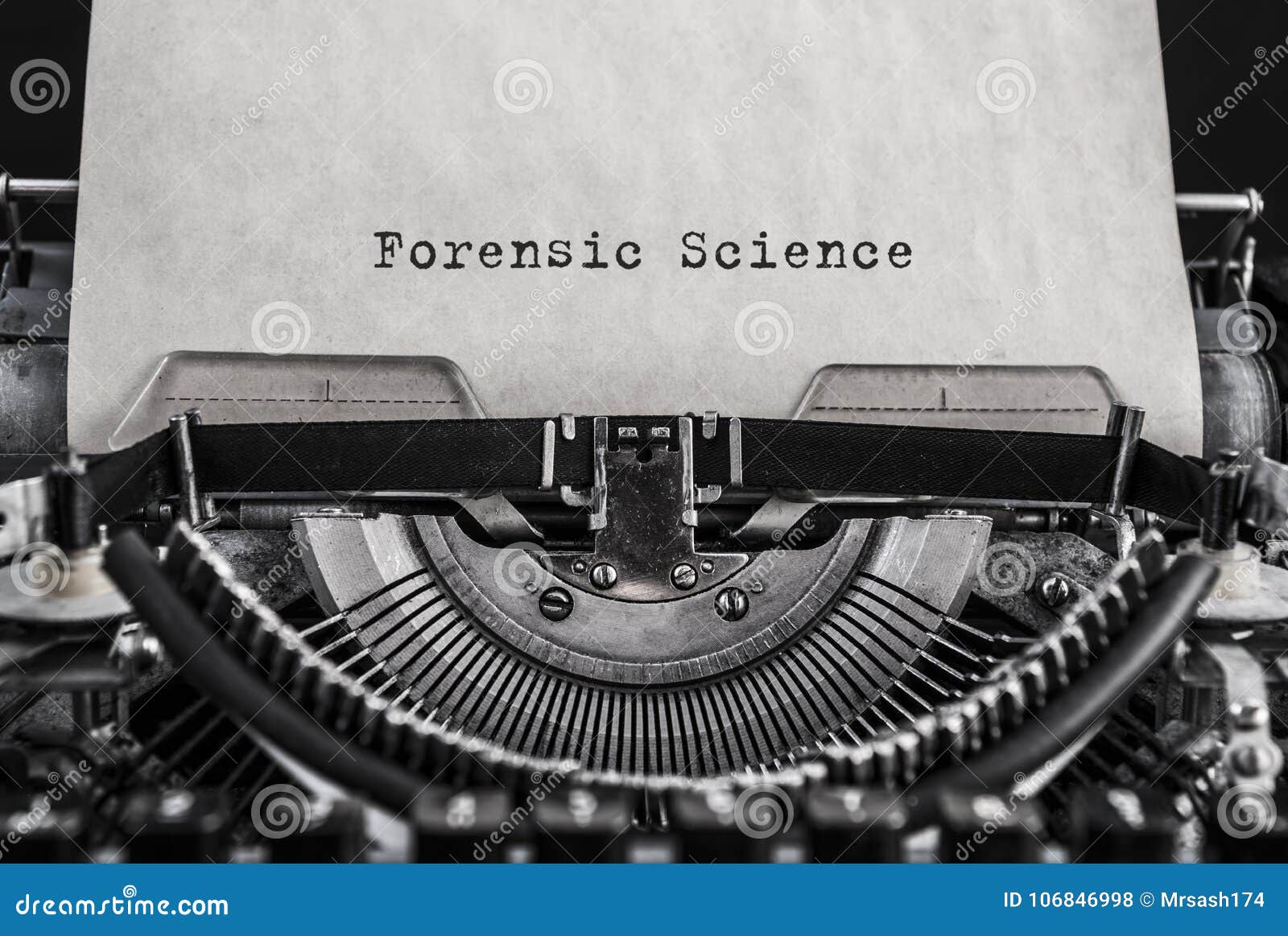 forensic science words typed on vintage typewriter.