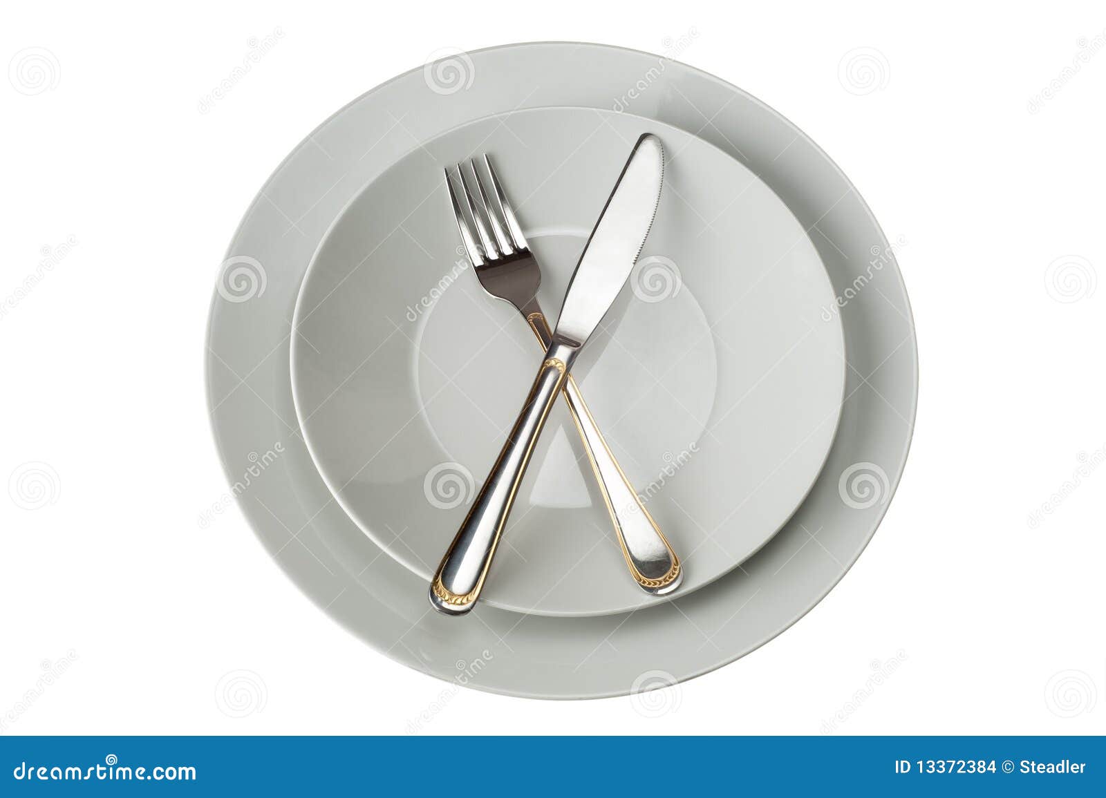 Fork and Knife on Plate stock photo. Image of kitchen 13372384