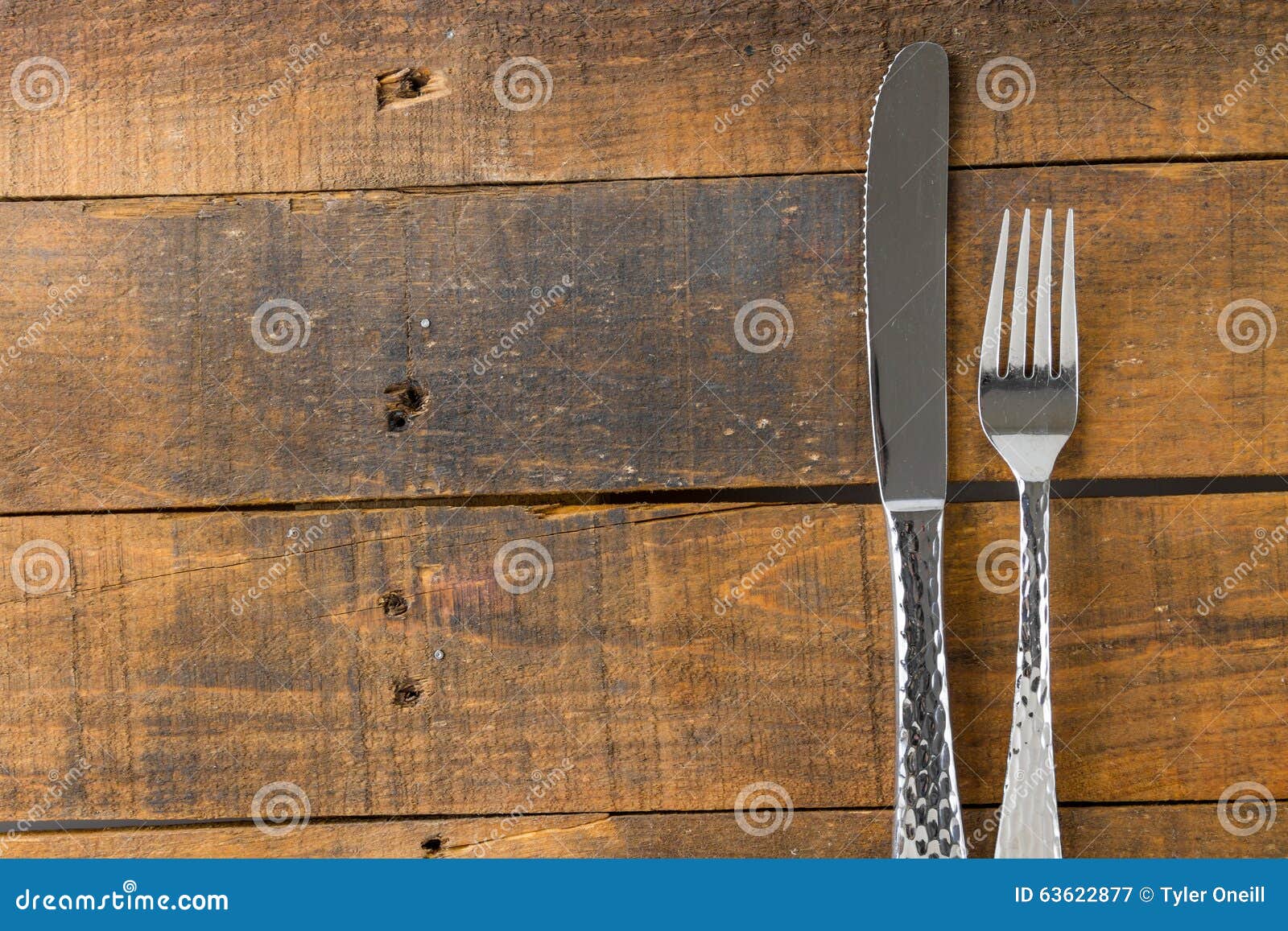 Fork and knife on wood stock image. Image of cutlery 63622877