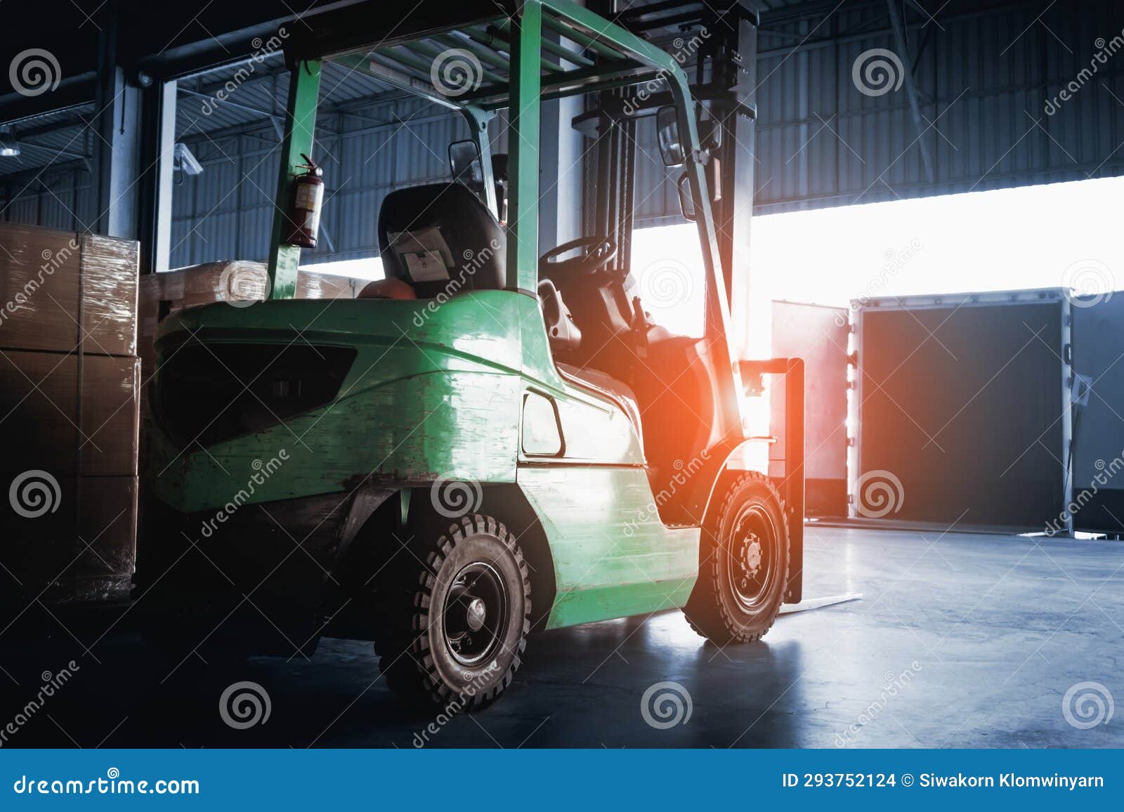 Forklift Tractor Parked in Warehouse. Forklift Loader. Warehouse