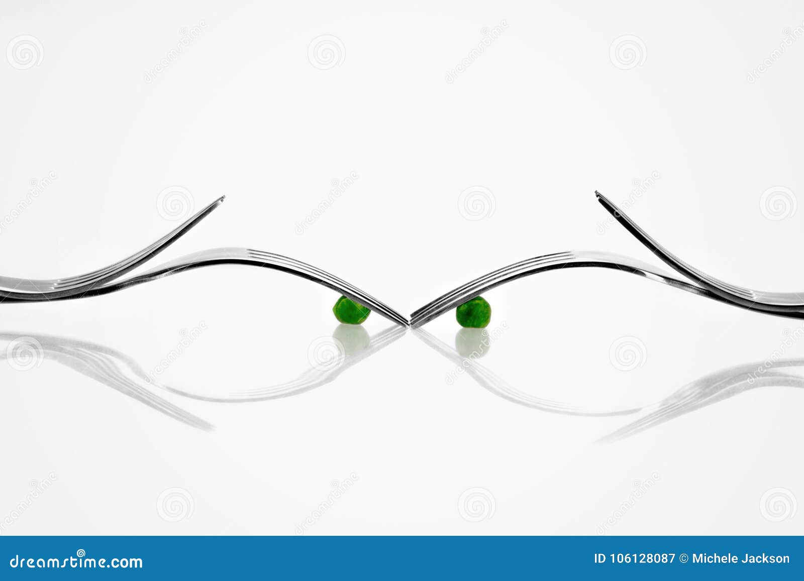 The Forks Form the Face and the Peas are the Eyes Stock Image Image
