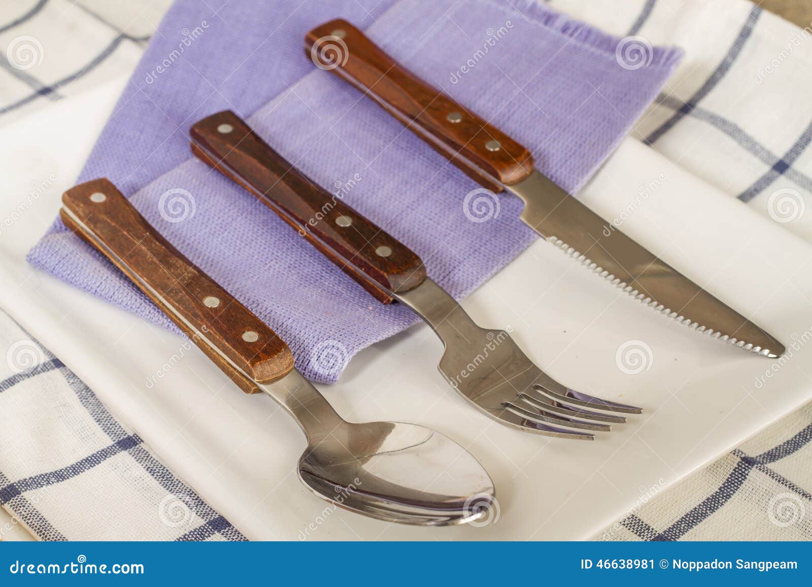 Forks and Spoons and Knives Laid on a Plate. Stock Image Image of diner, knives 46638981