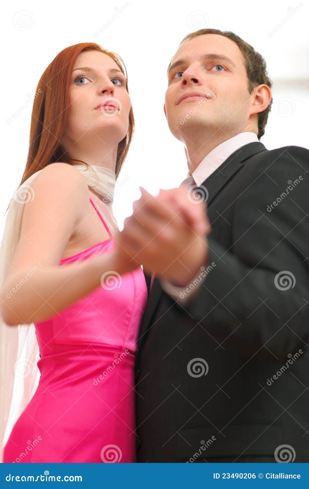 formally dressed dancing couple