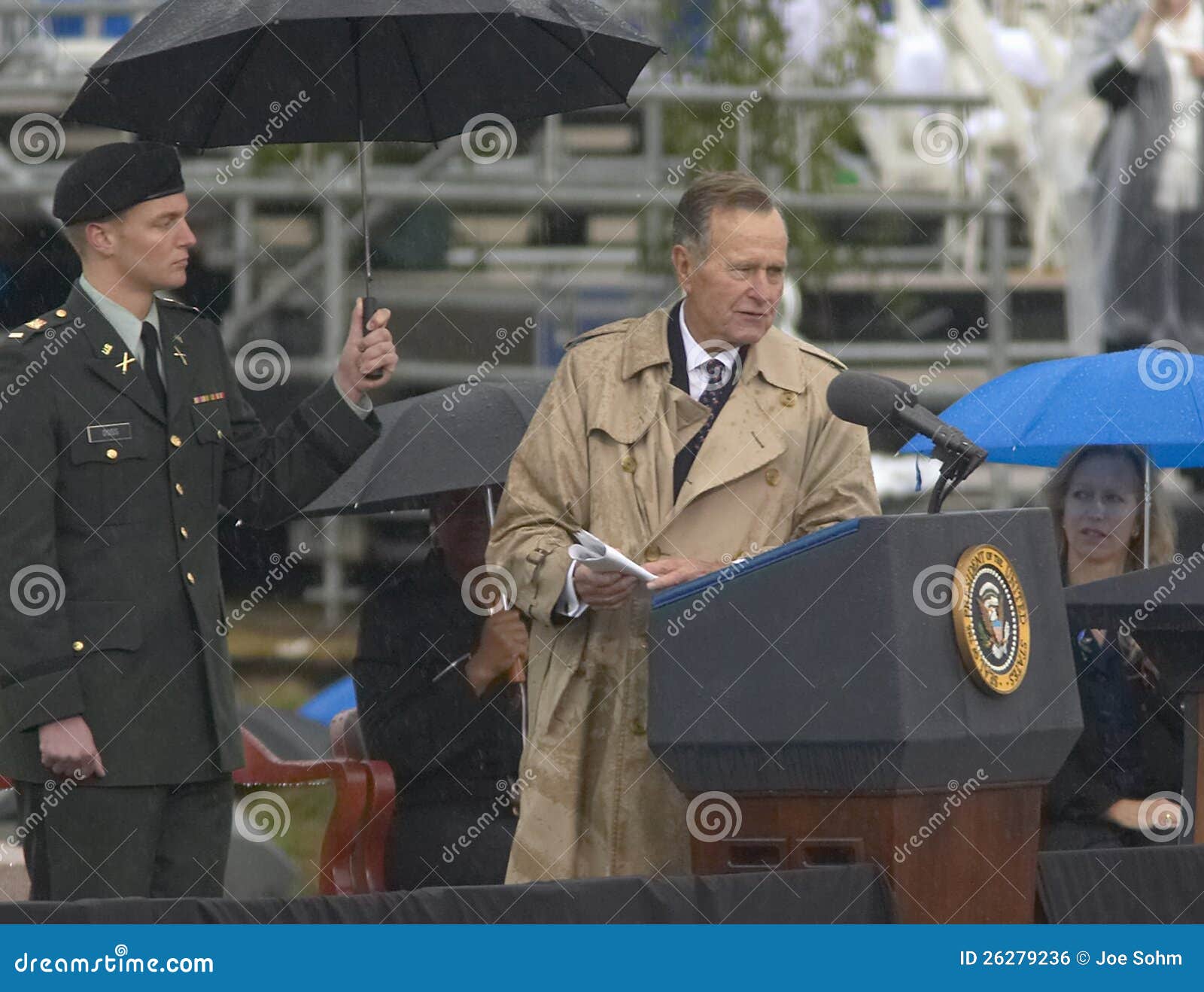 Former US President George HW Bush speaks during the grand opening ceremony of the William J. Clinton Presidential Center in Little Rock, AK 18 November 2004.