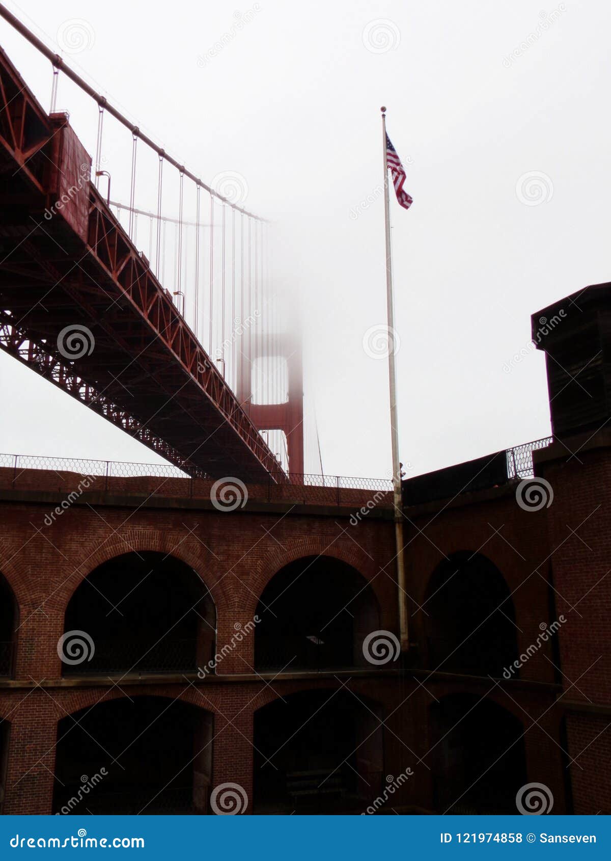 fort point, san francisco: view on golden gate bridge befogged