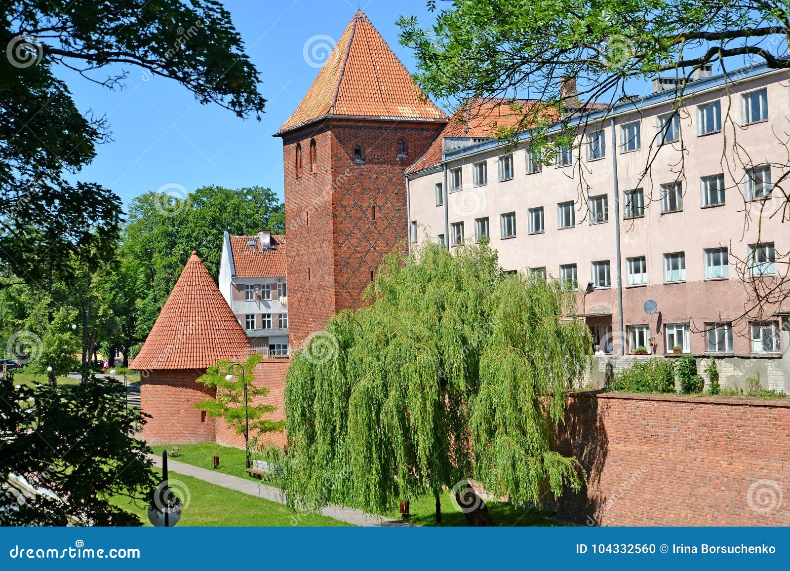 fortification, watchtower and gymnasium of jesuits in summer day. braniewo, poland