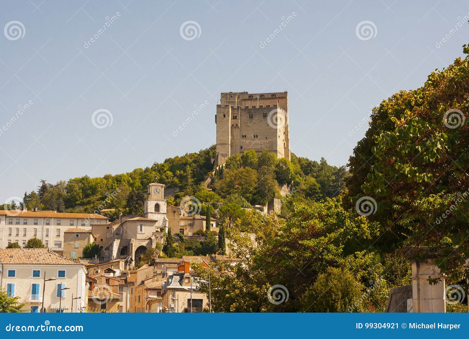 the fortified tower that dominates the skyline at pont de barret in the drome valley in the south of france