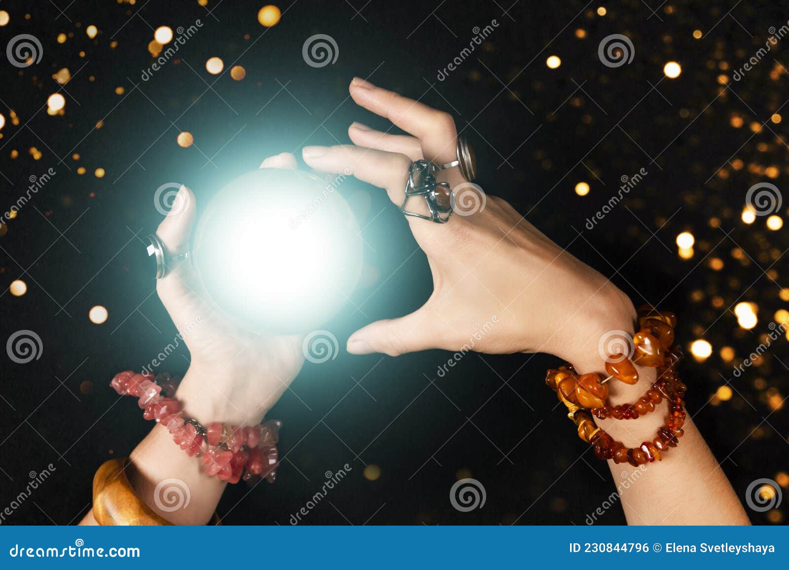 Fortune Teller or Witch Hands and a Glowing Magic Ball. Halloween