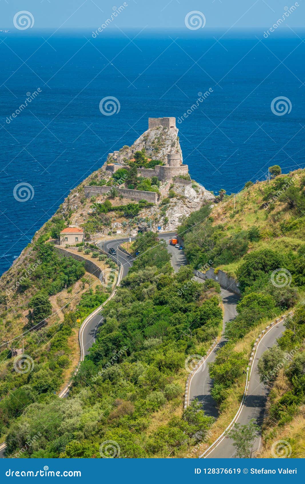 panoramic view from forza d`agrÃÂ², with the saracen castle in the background. province of messina, sicily, southern italy.