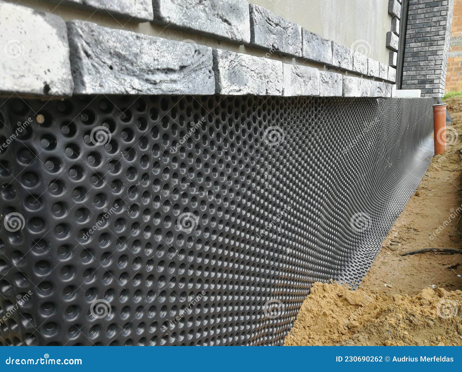 Foundation Drainage Preparation in Construction Site Stock Photo