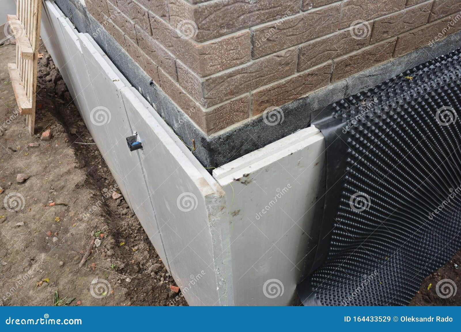 foundation insulation and damp proofing in problem corner area. house basement,foundation insulation details with waterproofing