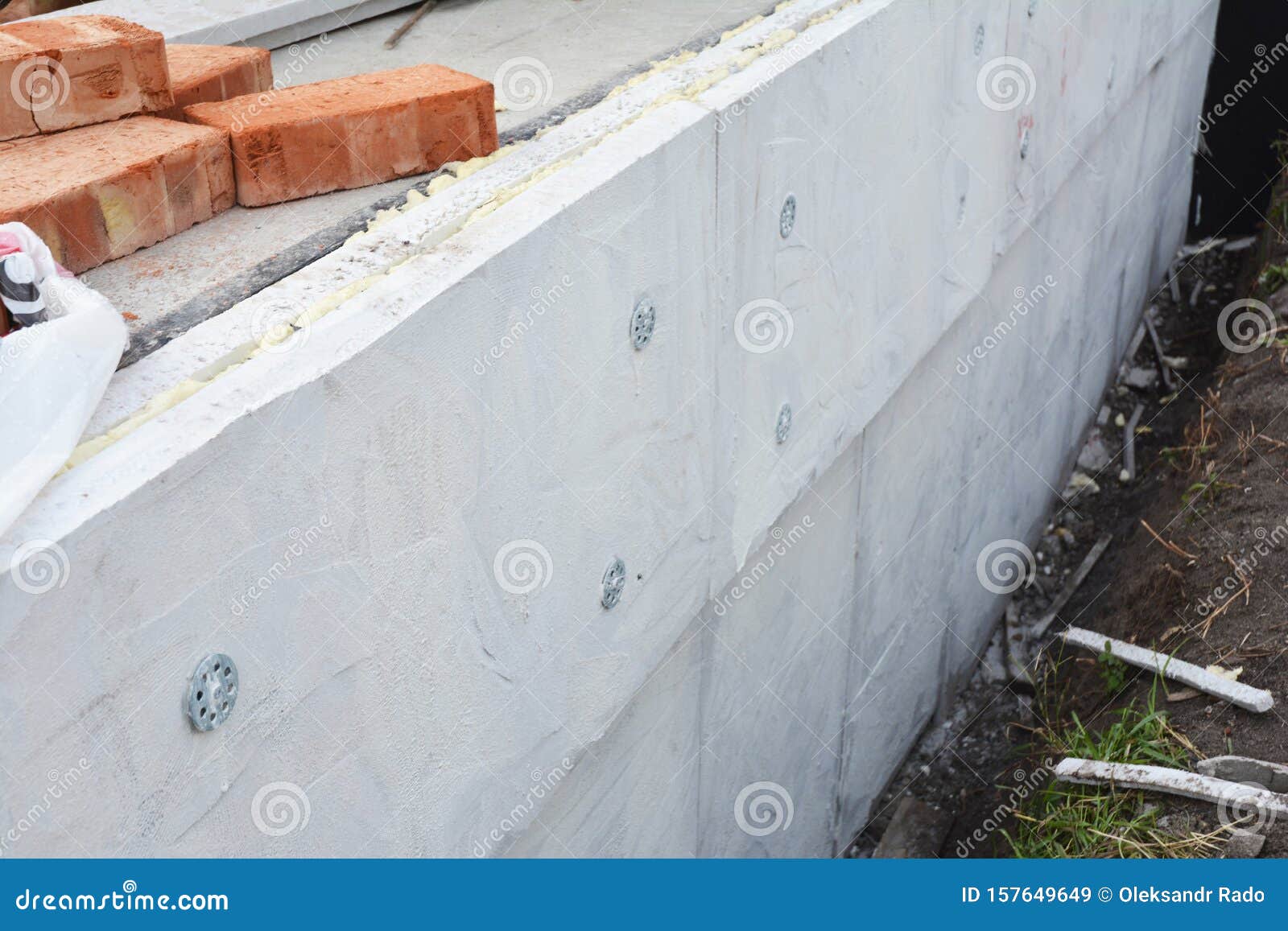 Damp Proof Membrane On Top Of Foundation Walls. Bitumen Waterproof