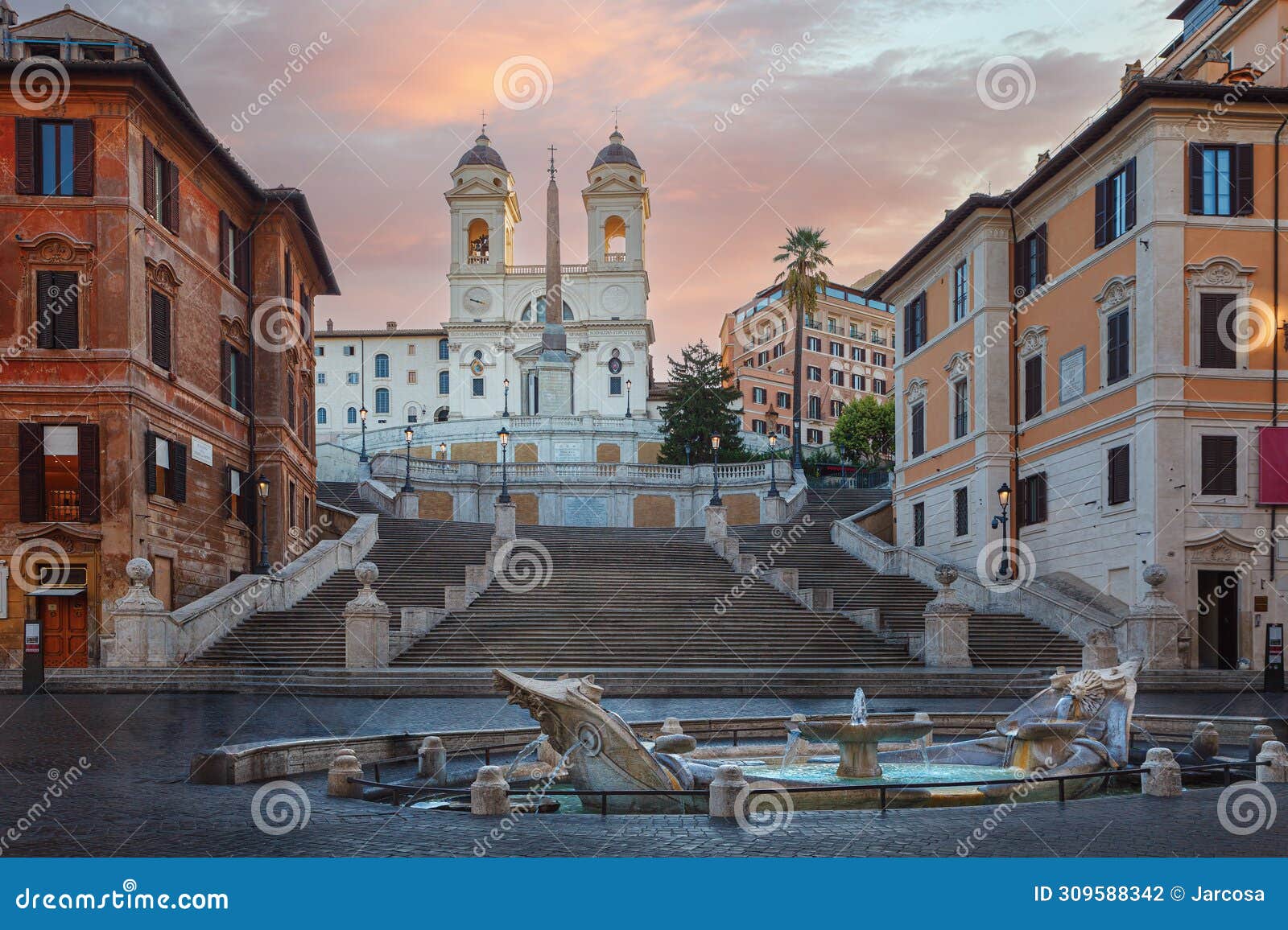 fountain of boat and spanish steps with trinita dei monti church in rome