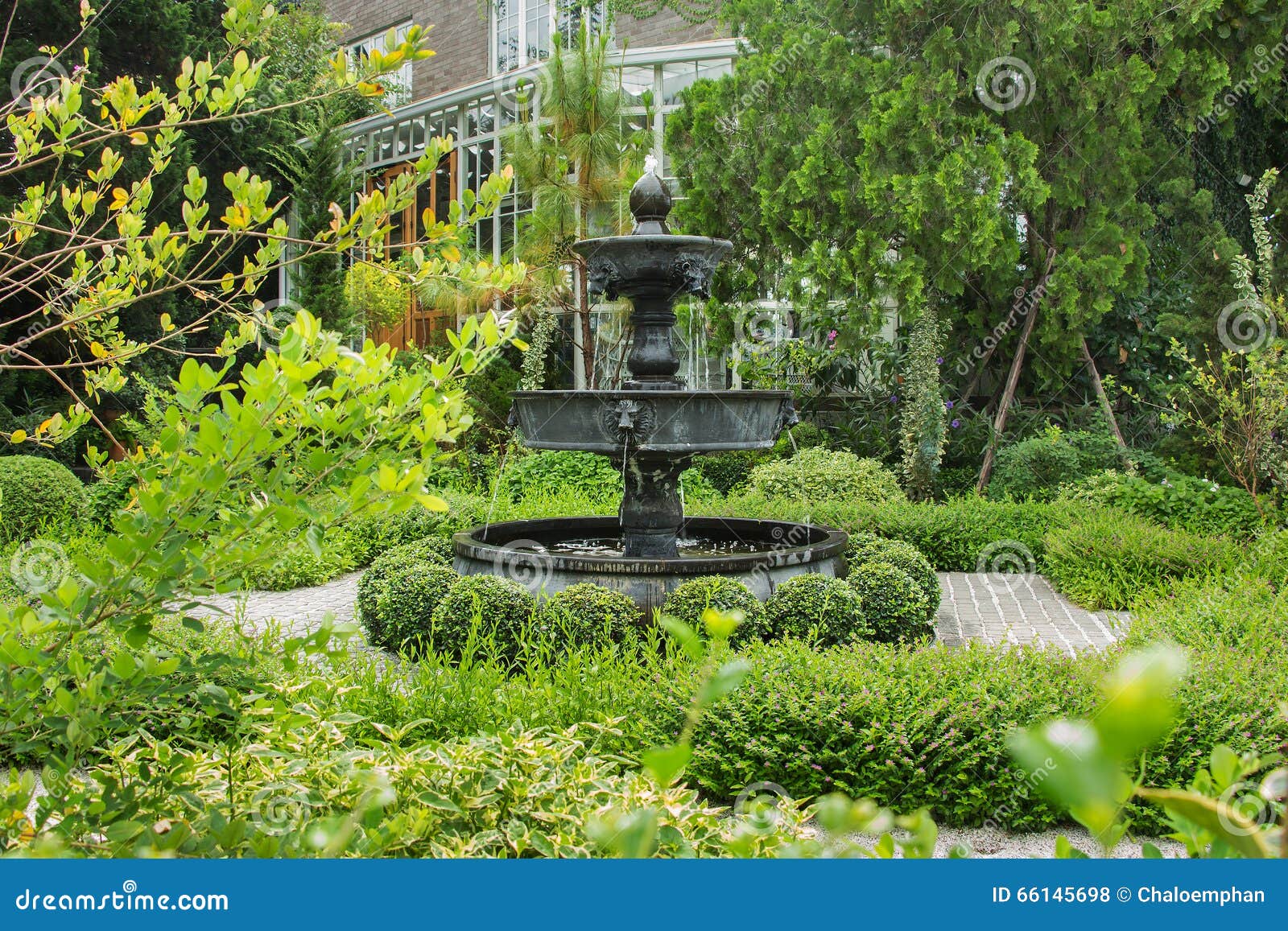 Fountain in English Garden Design. Stock Photo Image of flower