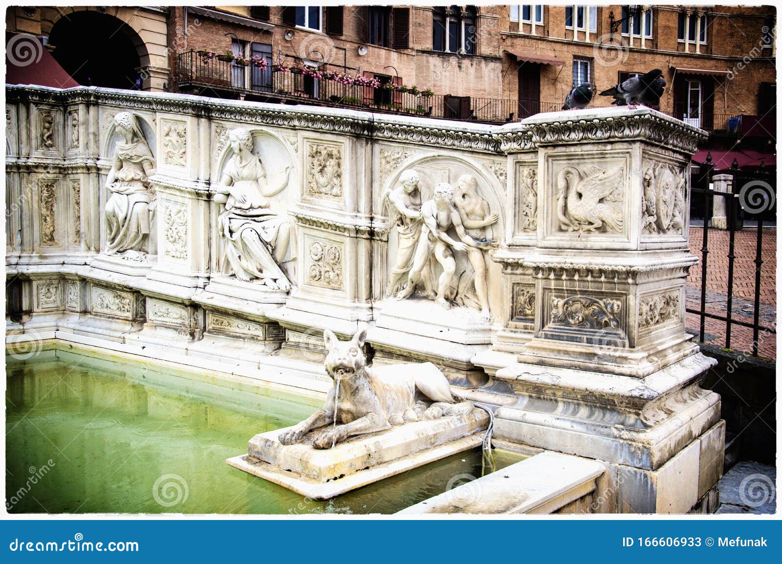 fountain of gaia, located on piazza del campo, siena, tuscany, italy with beautiful sculptures by jacopo della quercia