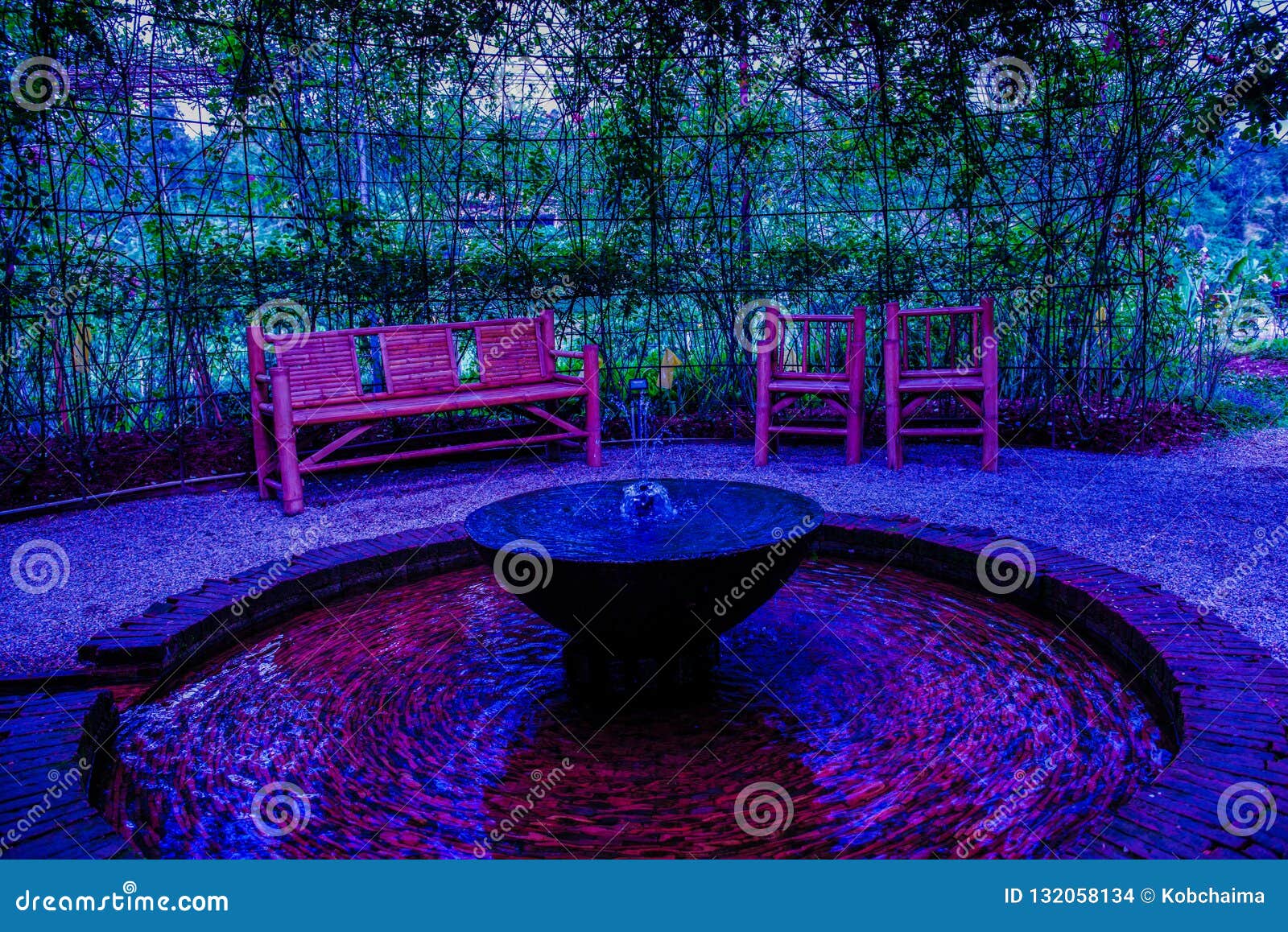 Fountain in the garden stock photo. Image of garden 132058134