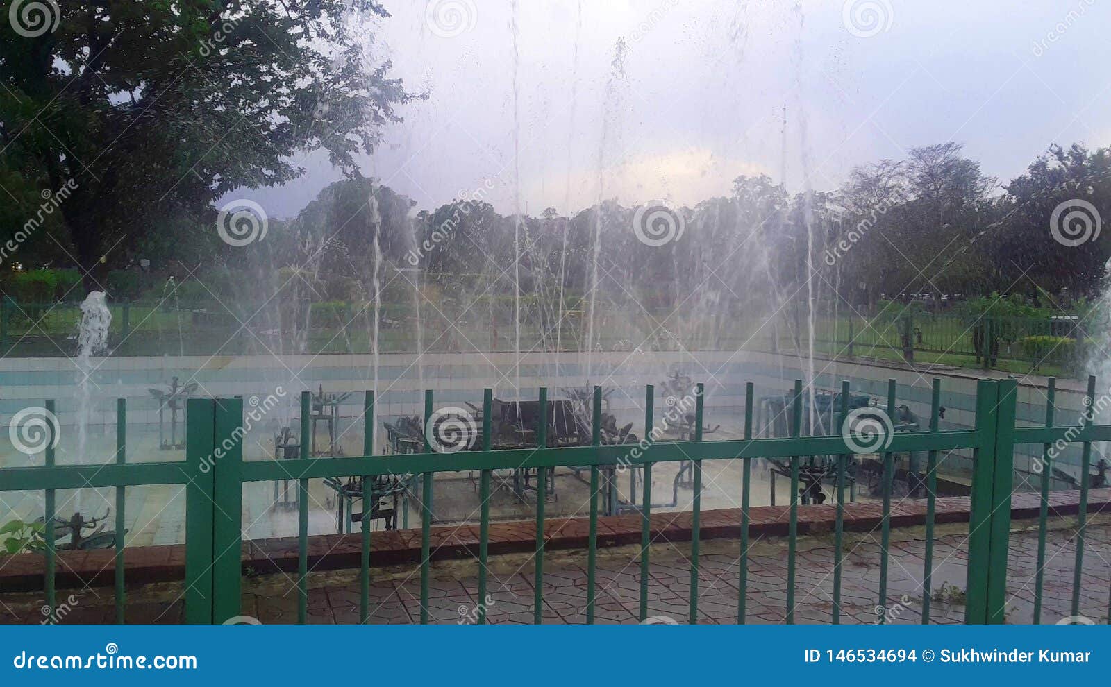 Fountain in the green park stock photo. Image of shape 146534694
