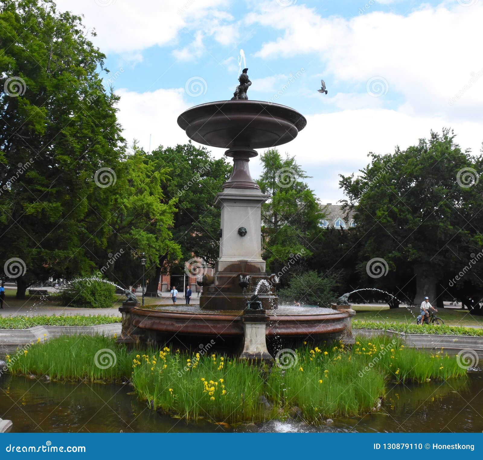 Fountain in Lund, Sweden stock photo. Image of tree 130879110