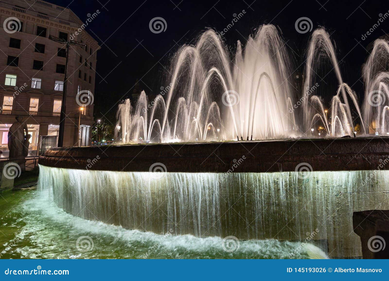 fountain at night - placa de catalunya - barcelona spain