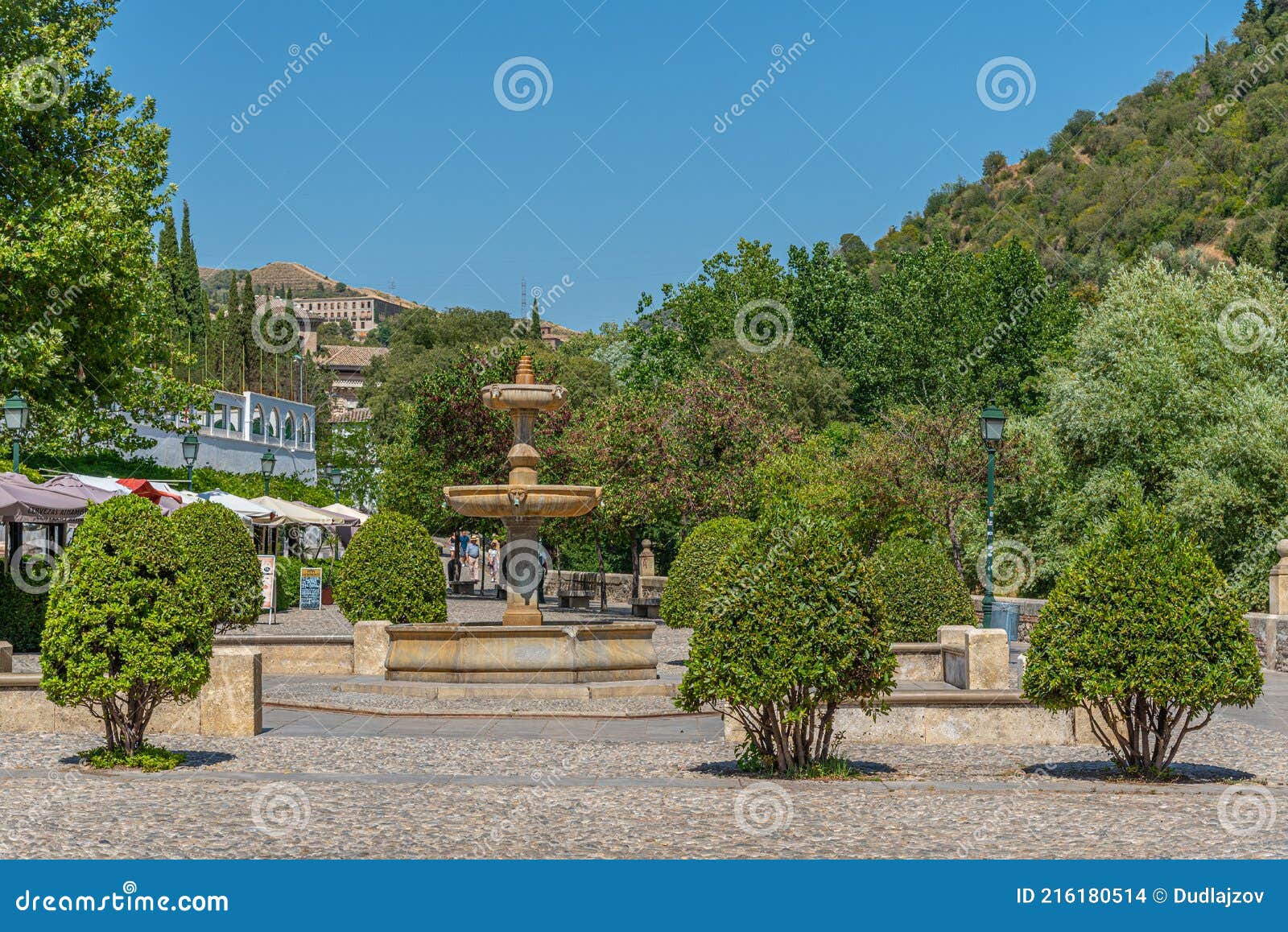 fountain at paseo de los tristes in granada, spain