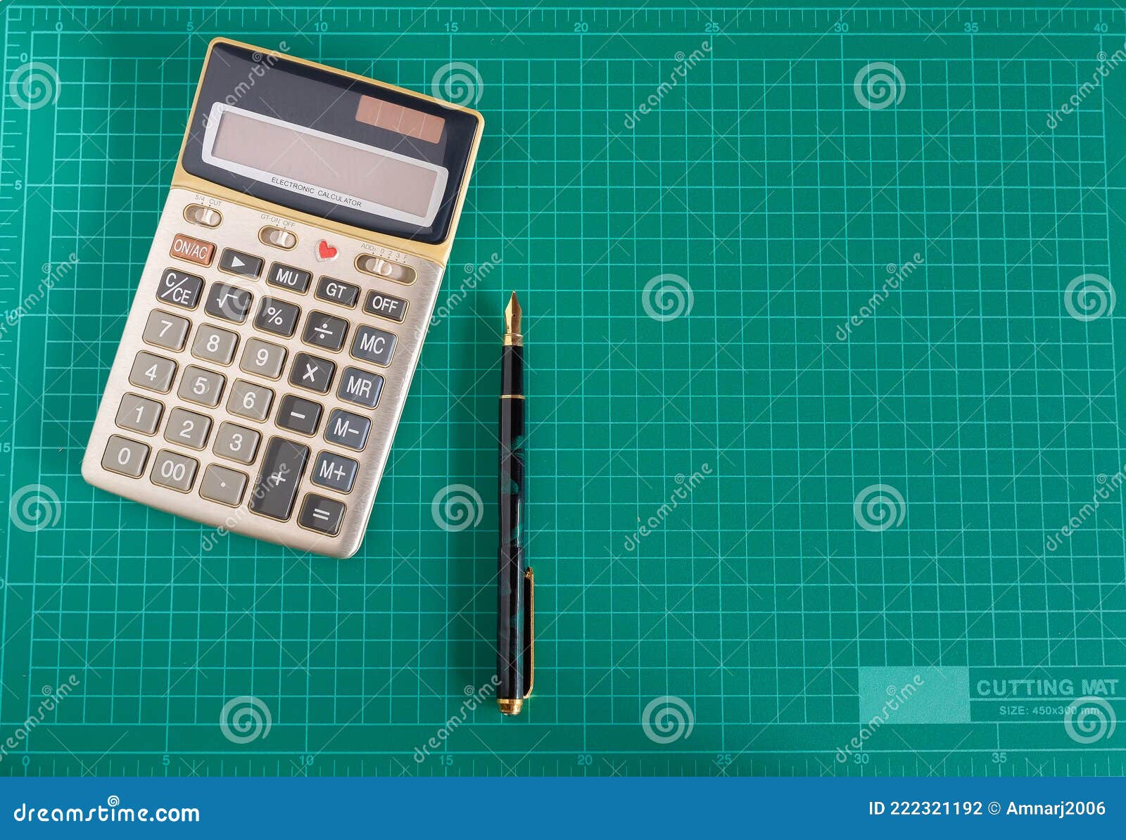 Fountain Pen with Calculator on Cutting Mat Stock Photo Image of