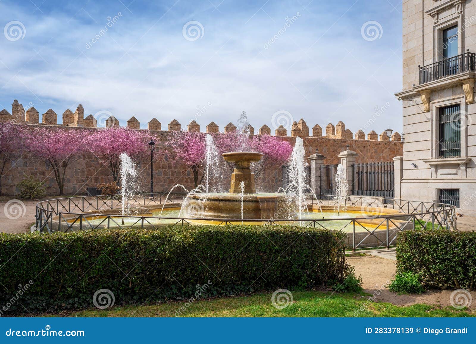 fountain at plaza adolfo suarez square - avila, spain