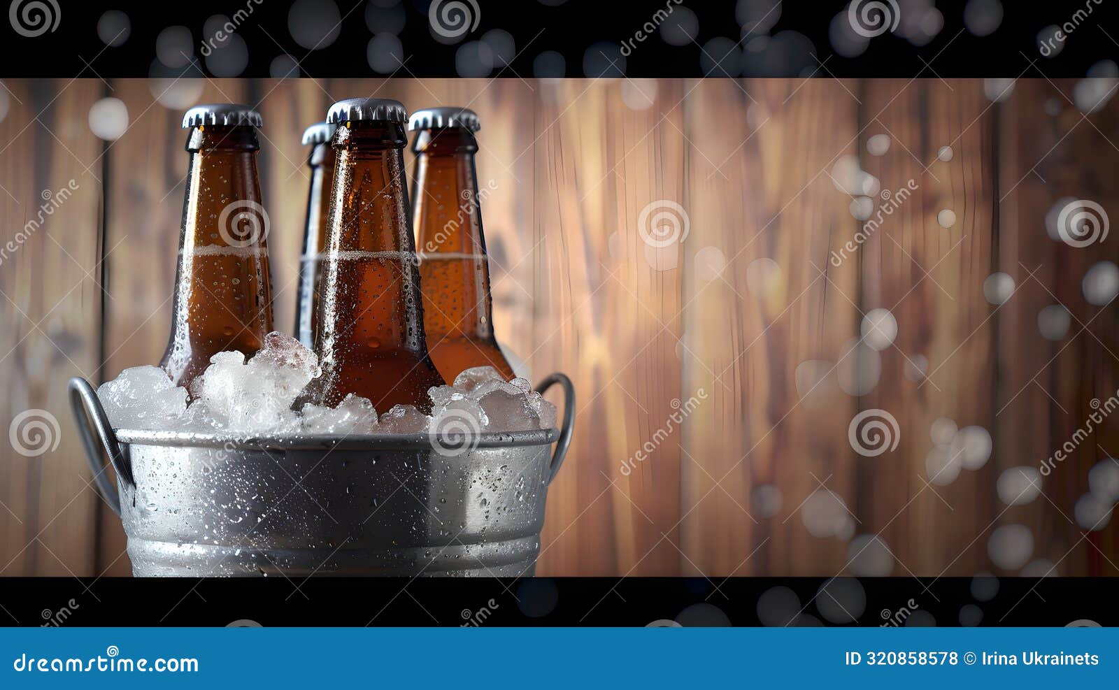 chilled beer bottles in a silver bucket full of ice. rustic wooden background. perfect for beverage advertising, drink