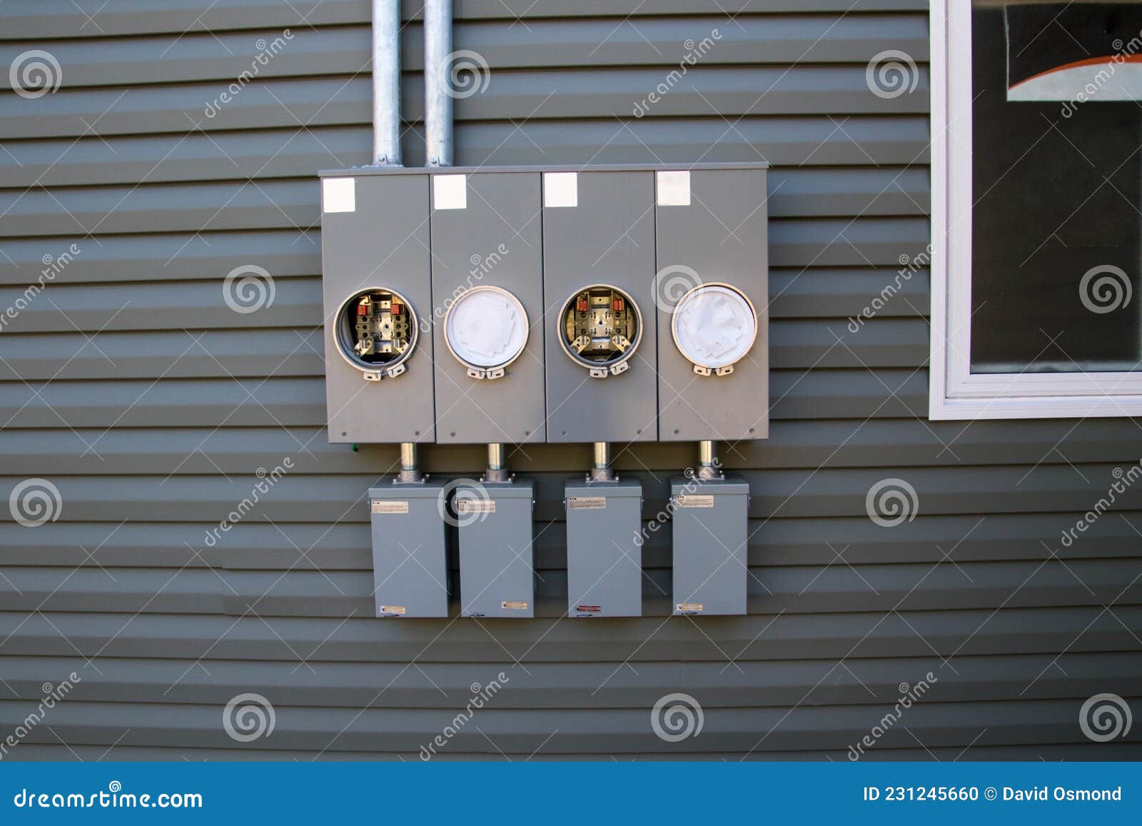Four Blank Electricity Meter Conections Stock Photo Image of siding