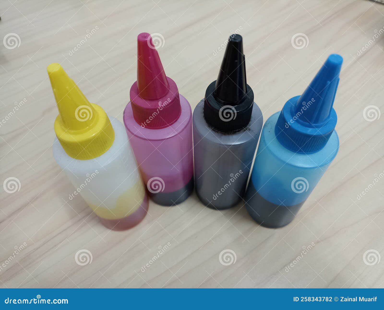 Four Bottles of Printer Ink Stock Photo Image of purple, blue 258343782