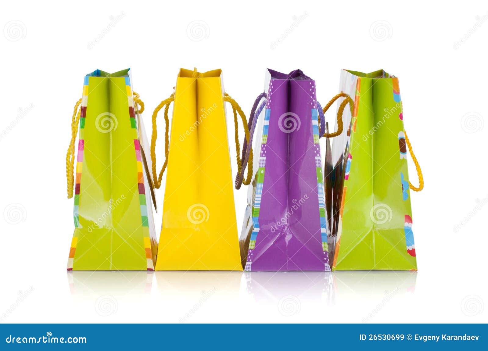 Four colored gift bags stock image. Image of commerce 26530699