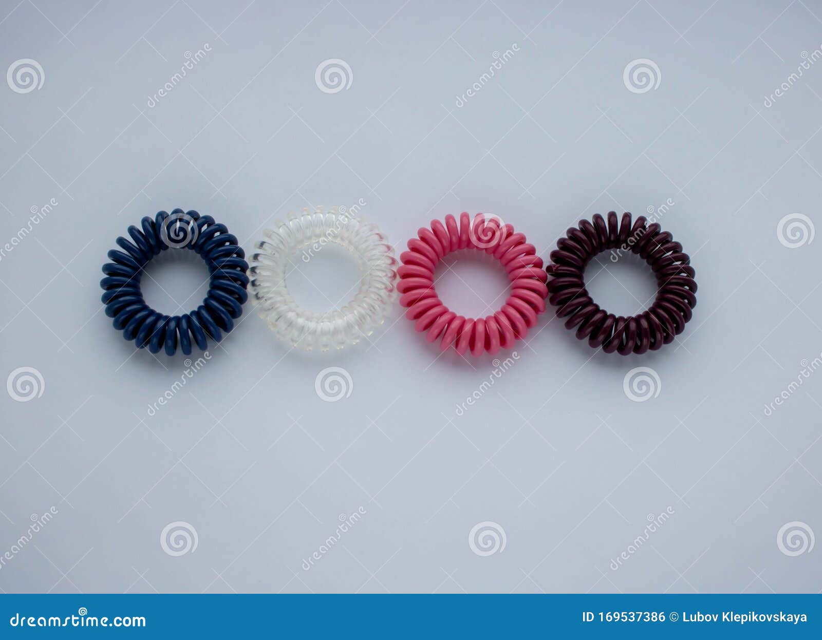 Four Colorful Spiral Rubber Bands. Elastic Hair Ties in Vibrant Colors ...
