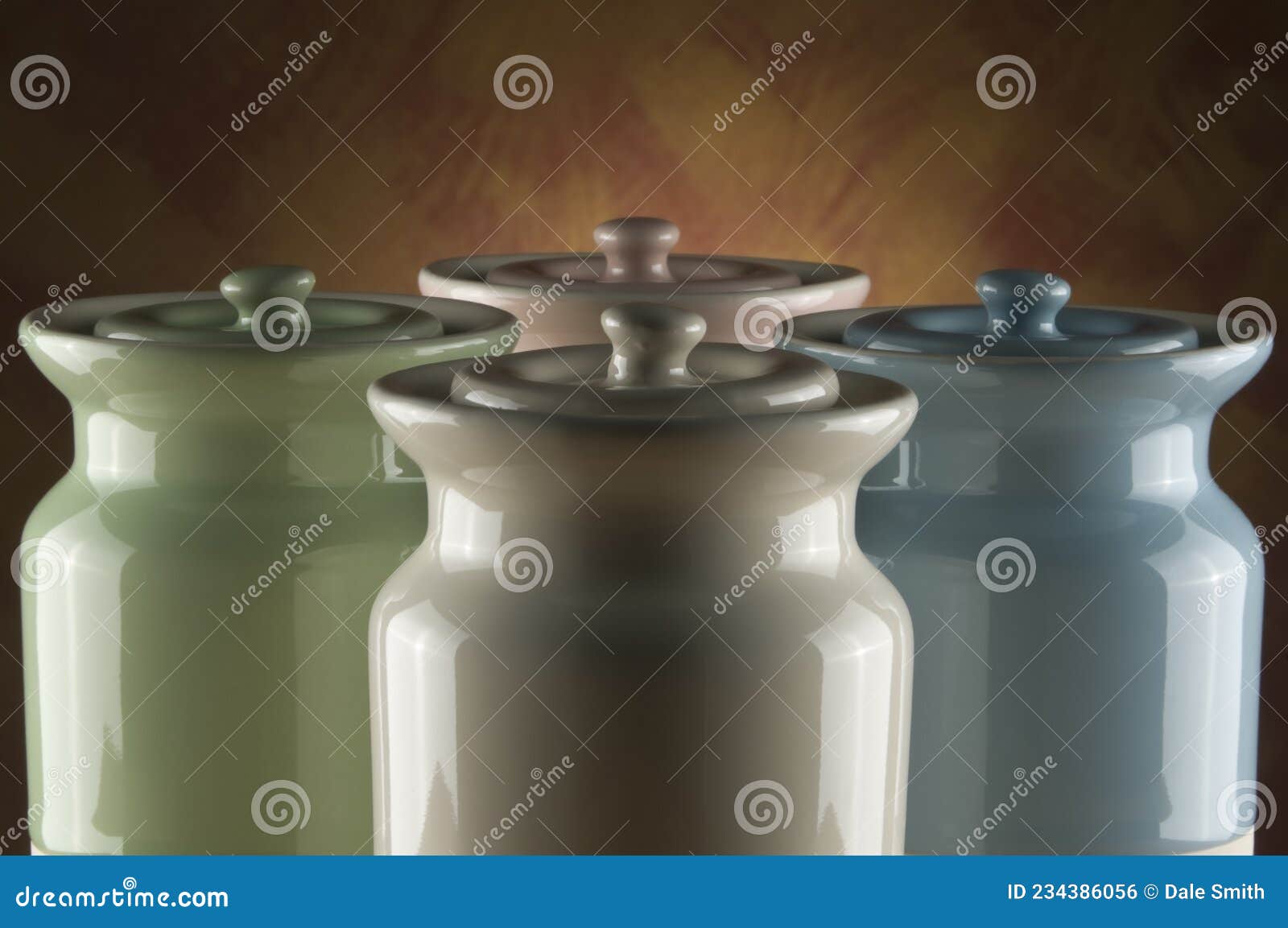 Ceramic Canisters, One Lying On Its Side On Wood Bench With Rice