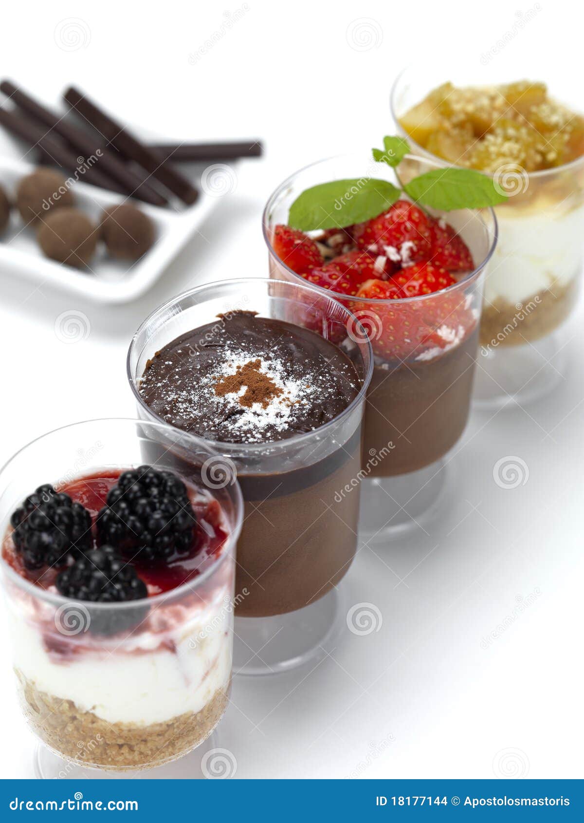 Four desserts in a row stock photo. Image of basil, sugar - 18177144