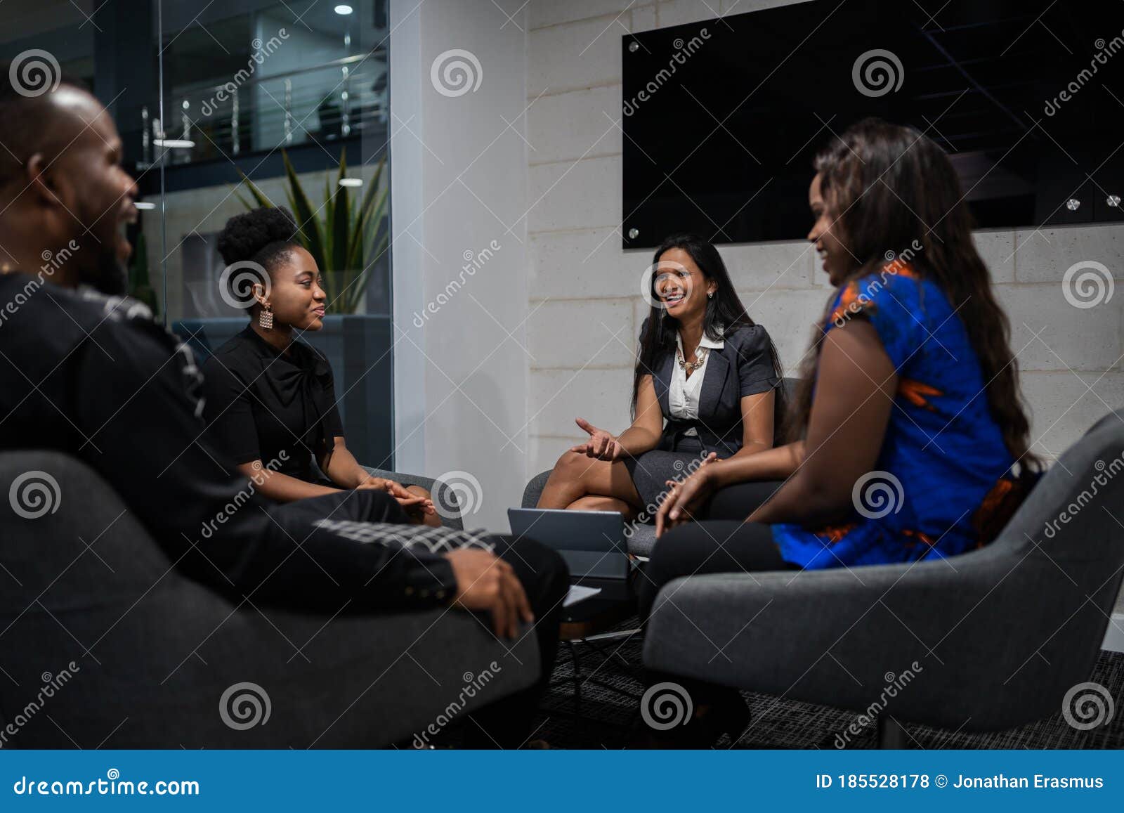 diverse south african colleagues having business strategy meeting in coworking workspace