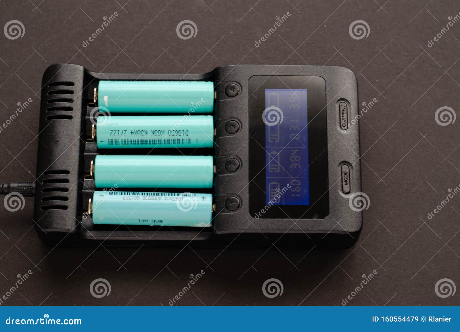 18650 Batteries Charging with Values Displayed Editorial Stock Image