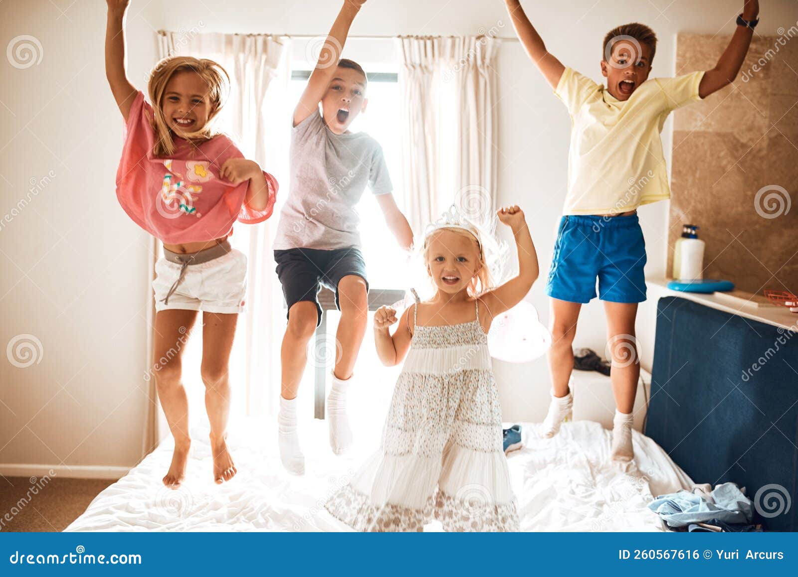 Four Little Monkeys Jumping on the Bed. Portrait of Little Siblings