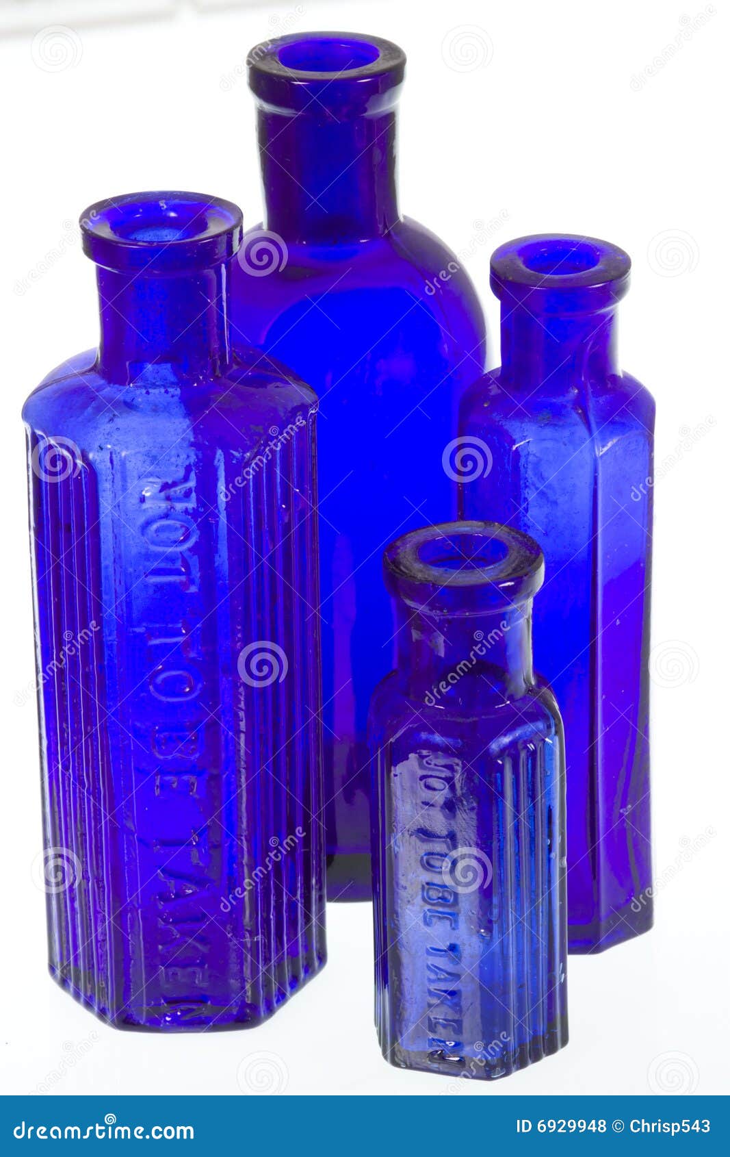 Download Four Old Blue Glass Medicine Bottles Stock Photo Image Of Plain Background 6929948 Yellowimages Mockups