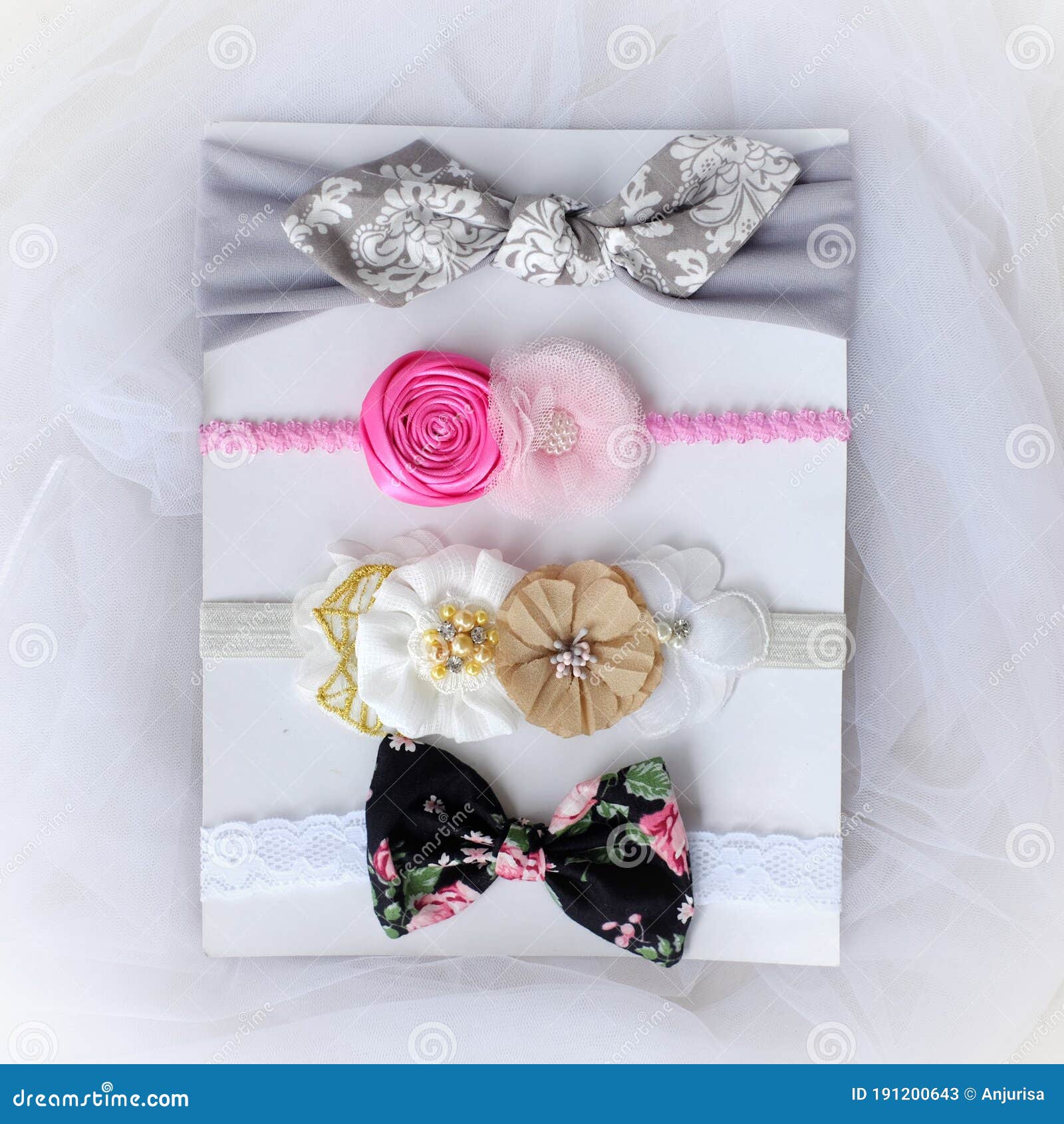 Four Pieces of Handmade Hair Accessories with Unique Design Placed on White  Tulle Fabric Stock Image - Image of craft, crafting: 191200643