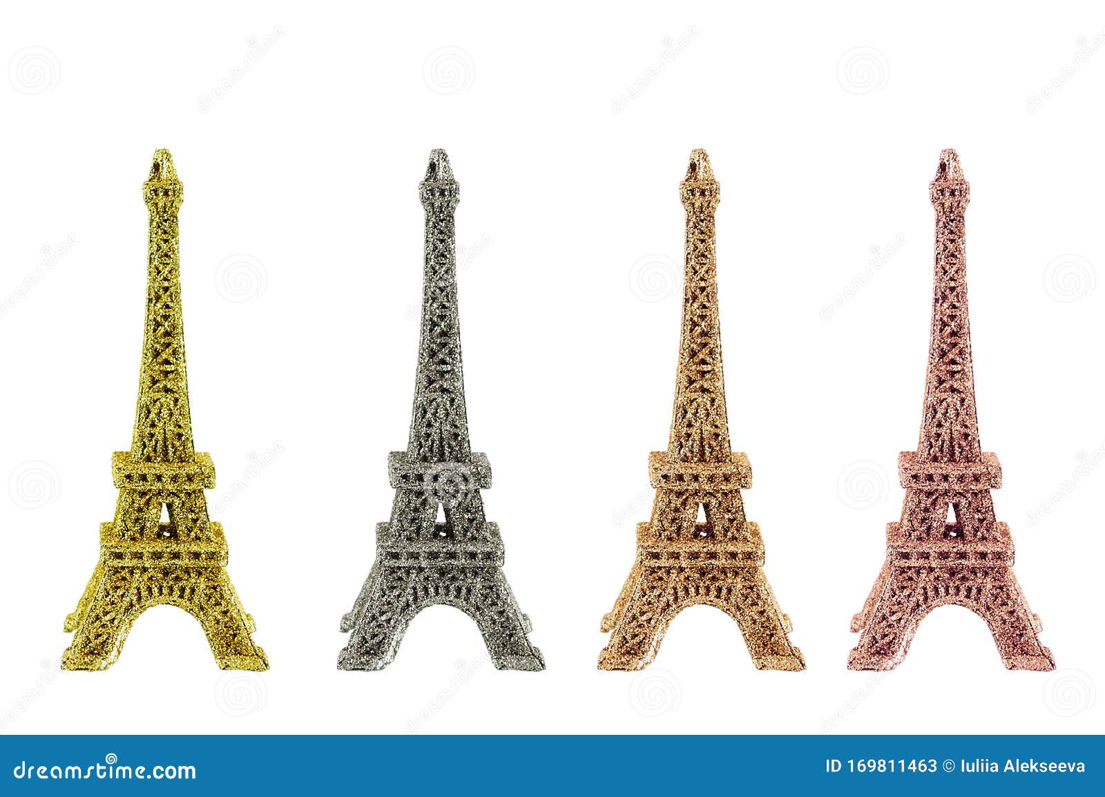 Four Shiny Figurines of the Eiffel Tower in Different Colors.isolate Stock Image - Image of ...