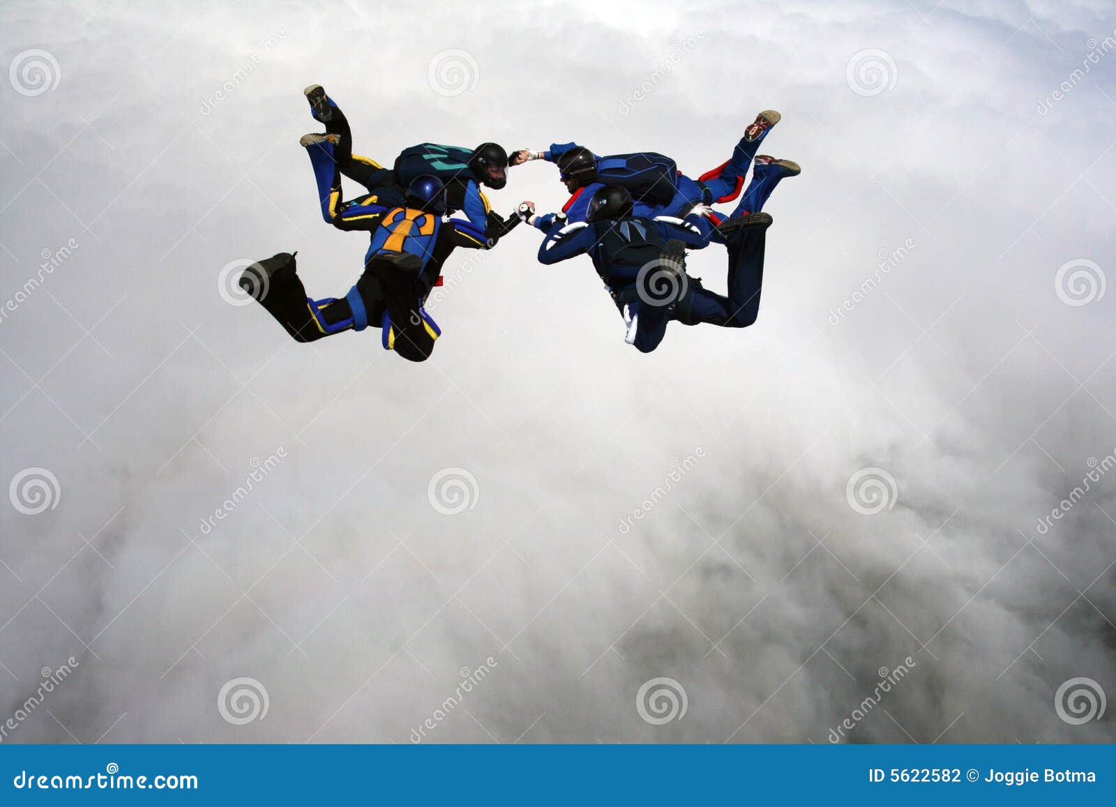 four skydivers